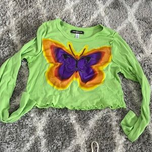 Green shirt with purple butterfly